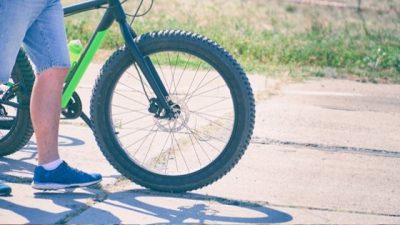 fat person riding a bike